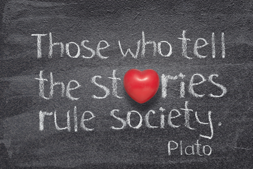 chalkboard with the words Those who tell the stories rule society by Plato